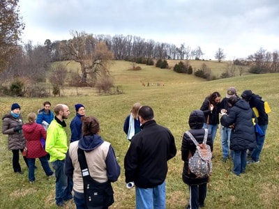 Members and friends on a site tour at their property.