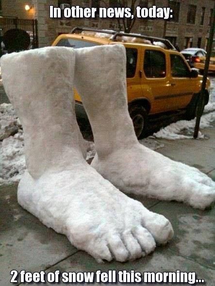 Giant sculpted feet made from snow