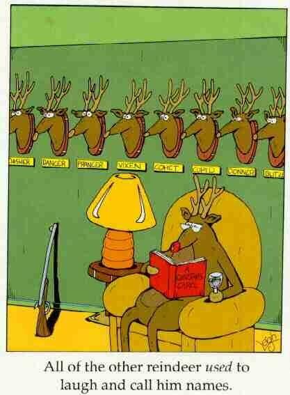 Picture of Rudolph sitting in chair with all the other reindeer heads on the wall