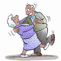 Two older people dancing