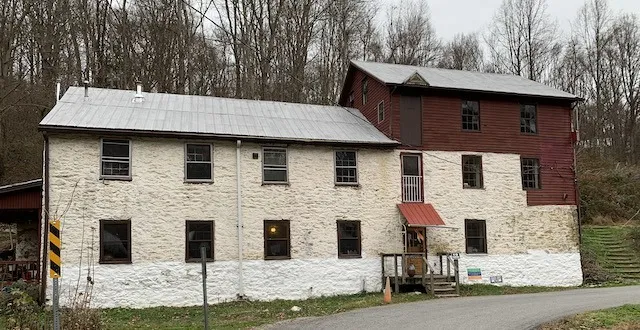 Red and white farm community building