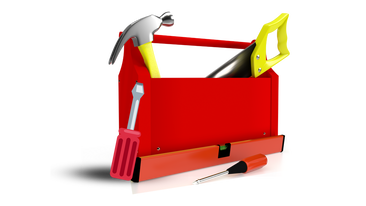 A toolbox and a set of tools lying around it