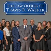 Group of people working for law office of Travis Walker